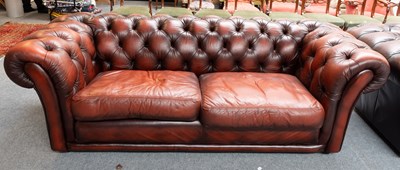 Lot 1217 - A Saxon Ox Blood Leather Chesterfield Style...