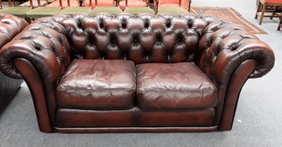 Lot 1216 - A Saxon Brown Leather Chesterfield Style Sofa,...
