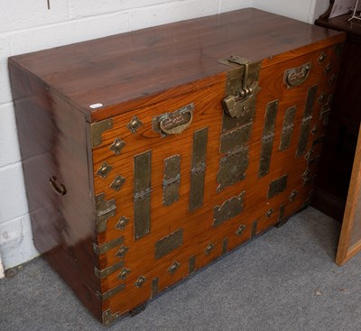Lot 1268 - A Korean Brass Mounted Elm Bandaji Chest,...