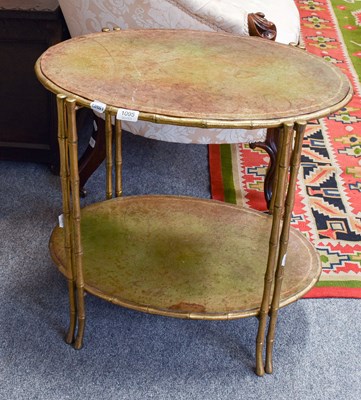Lot 1095 - A Gilt Metal and Leather Two-Tier Aesthetic...