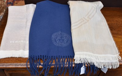 Lot 1379 - Two Similar Versace Wool Scarves in blue and...