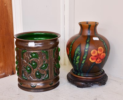 Lot 310 - A Floral Studio Glass Vase, on a wooden...