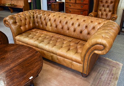 Lot 1119 - A Modern Tan Leather Chesterfield Sofa, 225cm