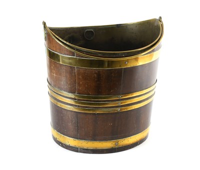 Lot 387 - A George III Mahogany and Brass-Bound Oval...