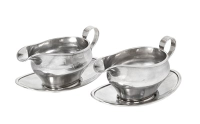 Lot A Pair of George VI Silver Sauceboats and Stands