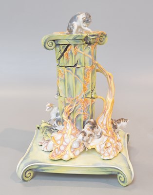 Lot 320 - A 20th Century Porcelain Model Group, "Cats on...