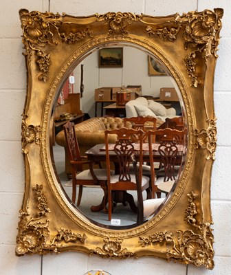 Lot 1142 - A Reproduction Gilt Framed Wall Mirror,...