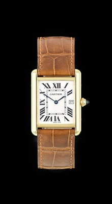 Lot 2378 - Cartier: An 18 Carat Gold Rectangular Calendar...