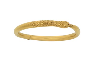 Lot 2228 - A Hinged Bangle of serpent form, with a...