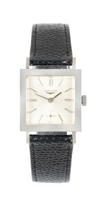 Lot 2479 - Longines: A Lady's Square Shaped 14 Carat...