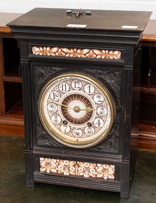 Lot 1164 - An Arts and Crafts Quarter Striking Ebonised...