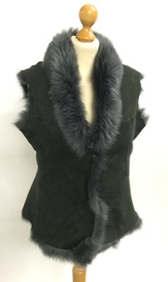 Lot 1053 - A Brora Sheepskin and Faux Fur Grey Gilet,...