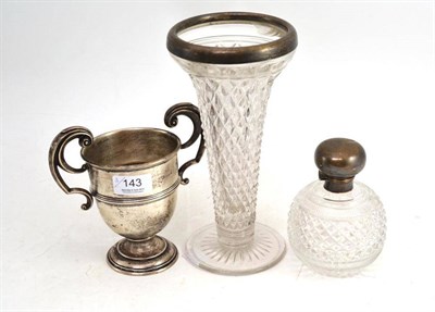 Lot 143 - Silver mounted cut glass scent bottle; twin handled silver trophy cup; and a silver mounted...