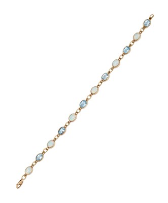 Lot 2404 - A 9 Carat Gold Blue Topaz and Synthetic Opal...