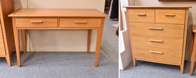 Lot 1154 - An Ercol Light Oak Four Height Chest of...
