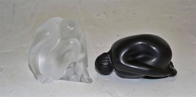 Lot 157 - Two modern Lalique nude figurines, 'Feuille Pliee' in black satin-finish crystal, 8cm; and a seated