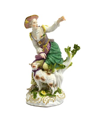 Lot 136 - A Meissen Porcelain Figure of a Shepherdess,...