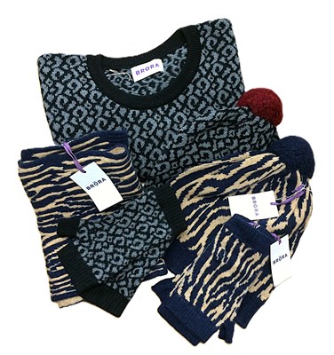 Lot 1050 - A Brora Cashmere Set, comprising a a black and...