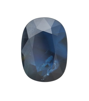 Lot 2285 - A Loose Cushion Cut Sapphire, weighing 6.316...