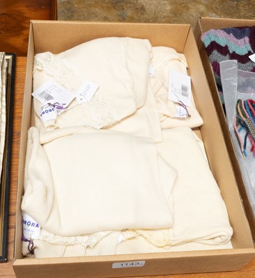 Lot 1143 - Four Brora Lace Trimed Thermal Wear, in cream,...