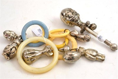 Lot 174 - Seven babies rattles, one stamped Sterling silver