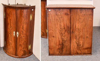 Lot 1123 - A George III Mahogany Bow Front Hanging Corner...