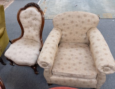 Lot 1224 - An Upholstered Armchair, with squab cushion,...