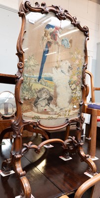 Lot 1258 - A Victorian Carved Mahogany Fire screen, the...