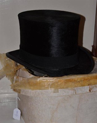 Lot 189 - A black silk covered top hat by George Bell, Hawick