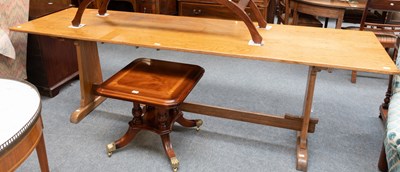 Lot 1241 - A 20th Century Oak Kitchen Table, on trestle...