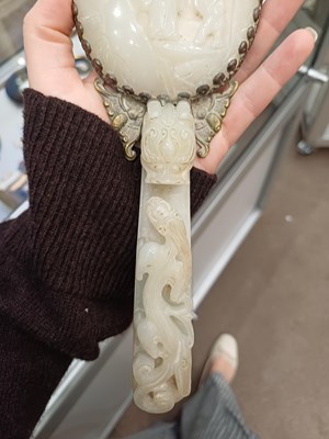 Lot 78 - A Chinese Jade-Mounted Hand Mirror, the jade...
