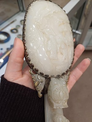 Lot 78 - A Chinese Jade-Mounted Hand Mirror, the jade...