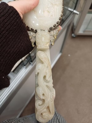 Lot 78 - A Chinese Jade-Mounted Hand Mirror, the jade...