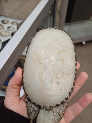 Lot 78 - A Chinese Jade-Mounted Hand Mirror, the jade...