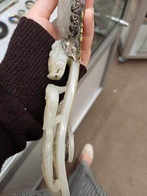 Lot 78 - A Chinese Jade-Mounted Hand Mirror, the jade...