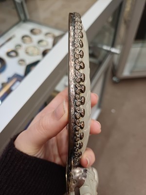Lot 78 - A Chinese Jade-Mounted Hand Mirror, the jade...