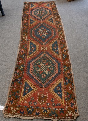 Lot 1300 - Heriz Runner, the terracotta field with three...