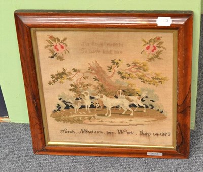 Lot 194 - A Victorian sampler worked by Sarah Nicholson, 1853, depicting a group of hounds in a rosewood...