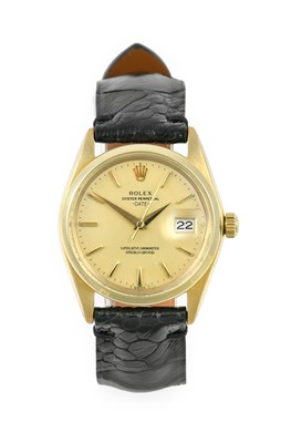 Lot 2363 - Rolex: A 9 Carat Gold Automatic Calendar...