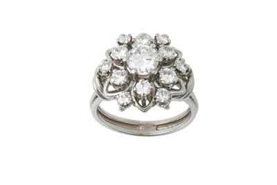 Lot 2324 - A Diamond Cluster Ring the central raised...