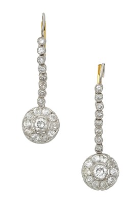 Lot 2273 - A Pair of Diamond Drop Earrings a row of eight...