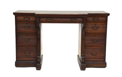 Lot 536 - A Gillow & Co Walnut Breakfront Desk, circa...