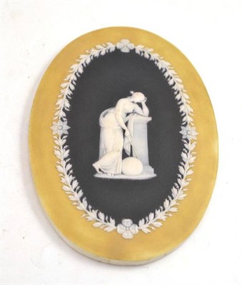 Lot 211 - A Wedgwood tri-colour Jasperware plaque, impressed ";Wedgwood, England";, 17cm long