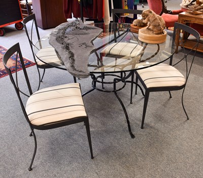 Lot 1108 - A Heal's "Coniston" Glass Topped Wrought Iron...