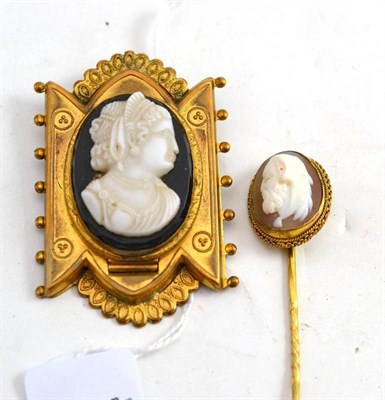 Lot 212 - A 19th century cameo locket brooch, the portrait of a maiden opens to reveal a locket panel,...