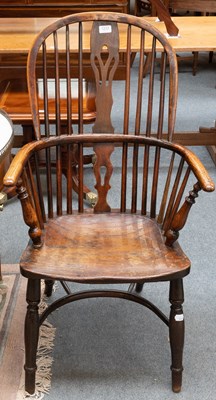 Lot 1237 - A 19th Century Ash and Elm Windsor Chair, with...