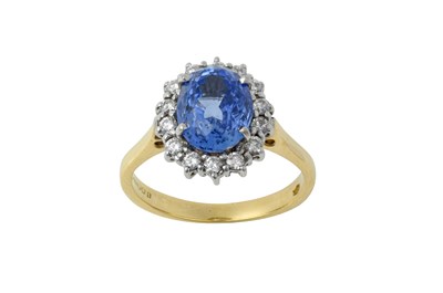 Lot 2331 - An 18 Carat Gold Sapphire and Diamond Cluster...