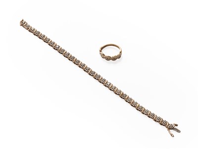 Lot 315 - A 9 Carat Gold Diamond Bracelet, twenty nine...