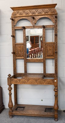 Lot 1230 - A 1920s Carved Oak Mirrored Hallstand, 92cm by...