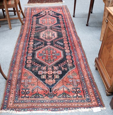 Lot 1269 - Hamadan Runner, the charcoal field centred by...